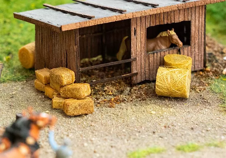 14 round and 18 square-cut bales of hay
