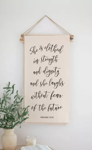 'She Is Clothed' Banner